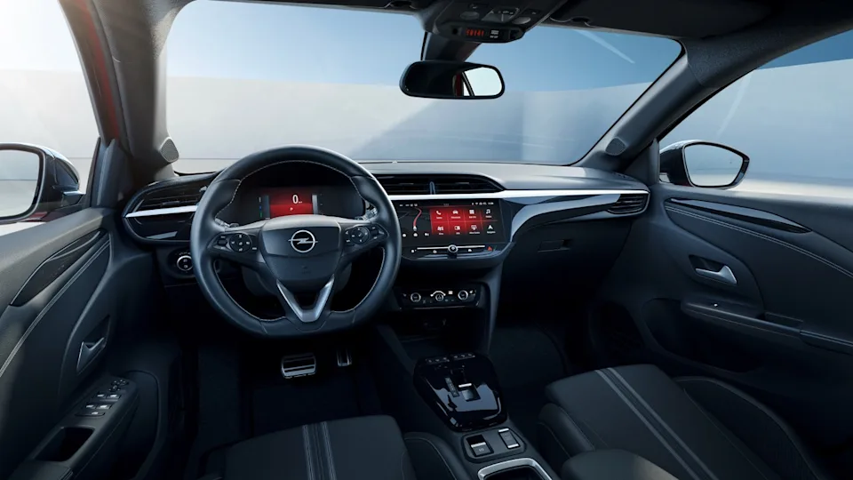Source: https://www.opel.se/personbilar/corsa/oversikt/_jcr_content/pageContent/grid_builder_v2/col1/tiled_gallery/item_1655293005802.coreimg.jpeg/1696840353890/opel-corsa-ice-interior-16x9-cosol23-i01-001.jpeg — opel.se (Wismo, Swedish importer), team-cleared 2026-10-05. Run: 2026-10-07