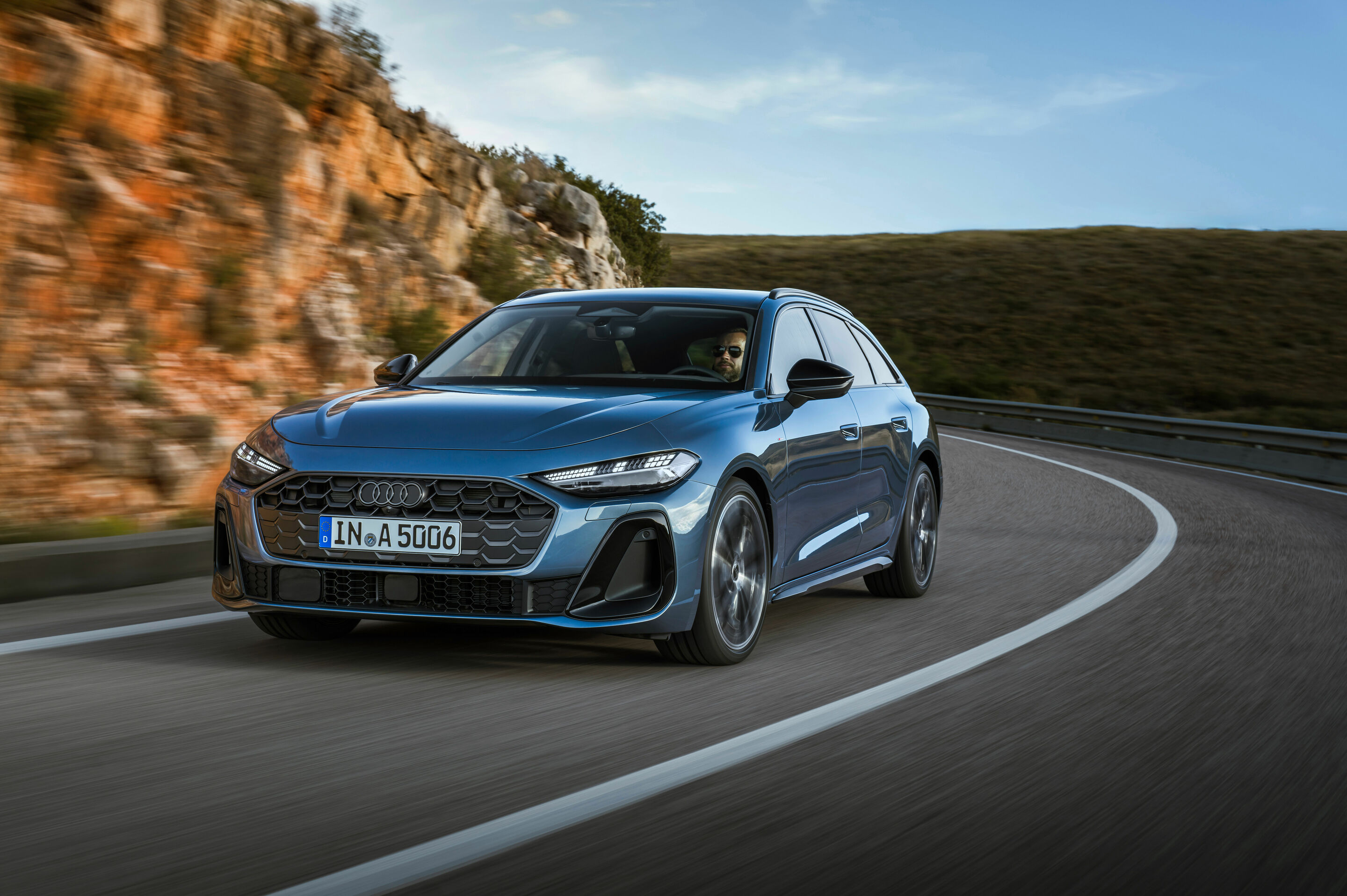 Audi A5 Avant, three-quarter front, dynamic press photo. Audi MediaCenter, editorial use.