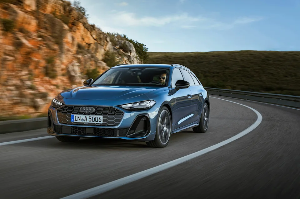 Audi A5 Avant, three-quarter front, dynamic press photo. Audi MediaCenter, editorial use.