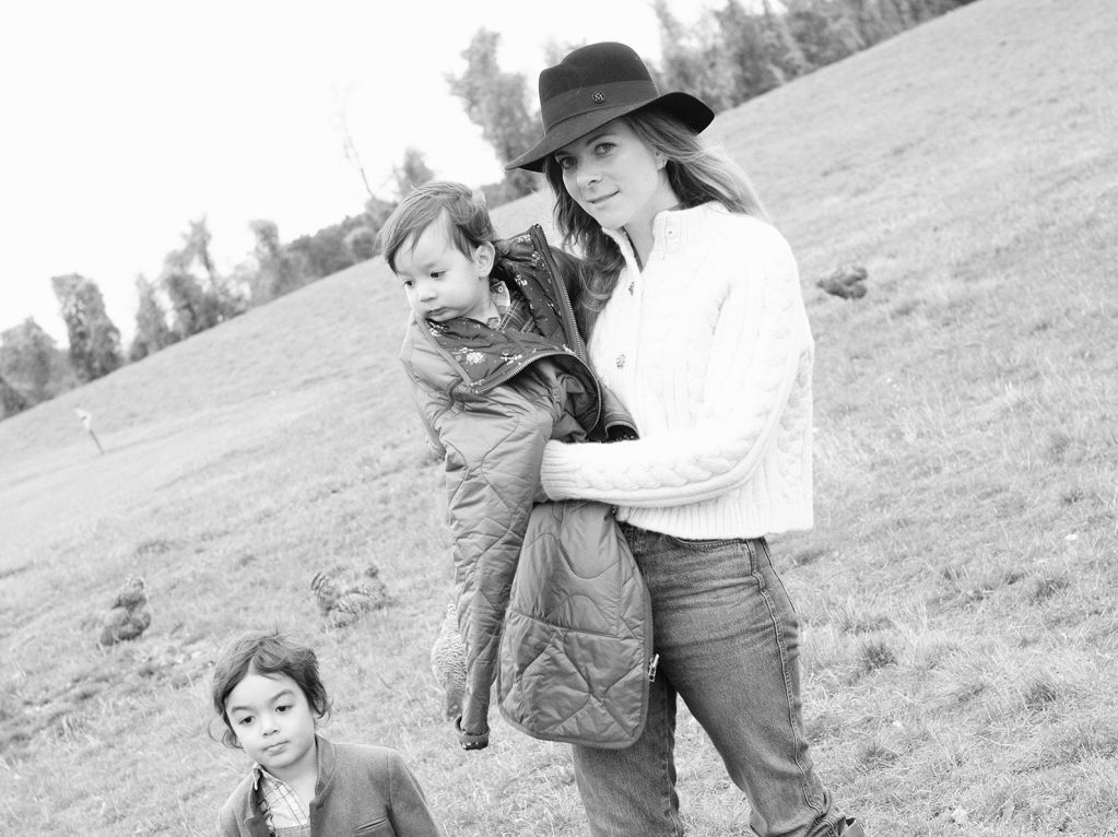 Carolina Gunnarsson in a field with her kids.