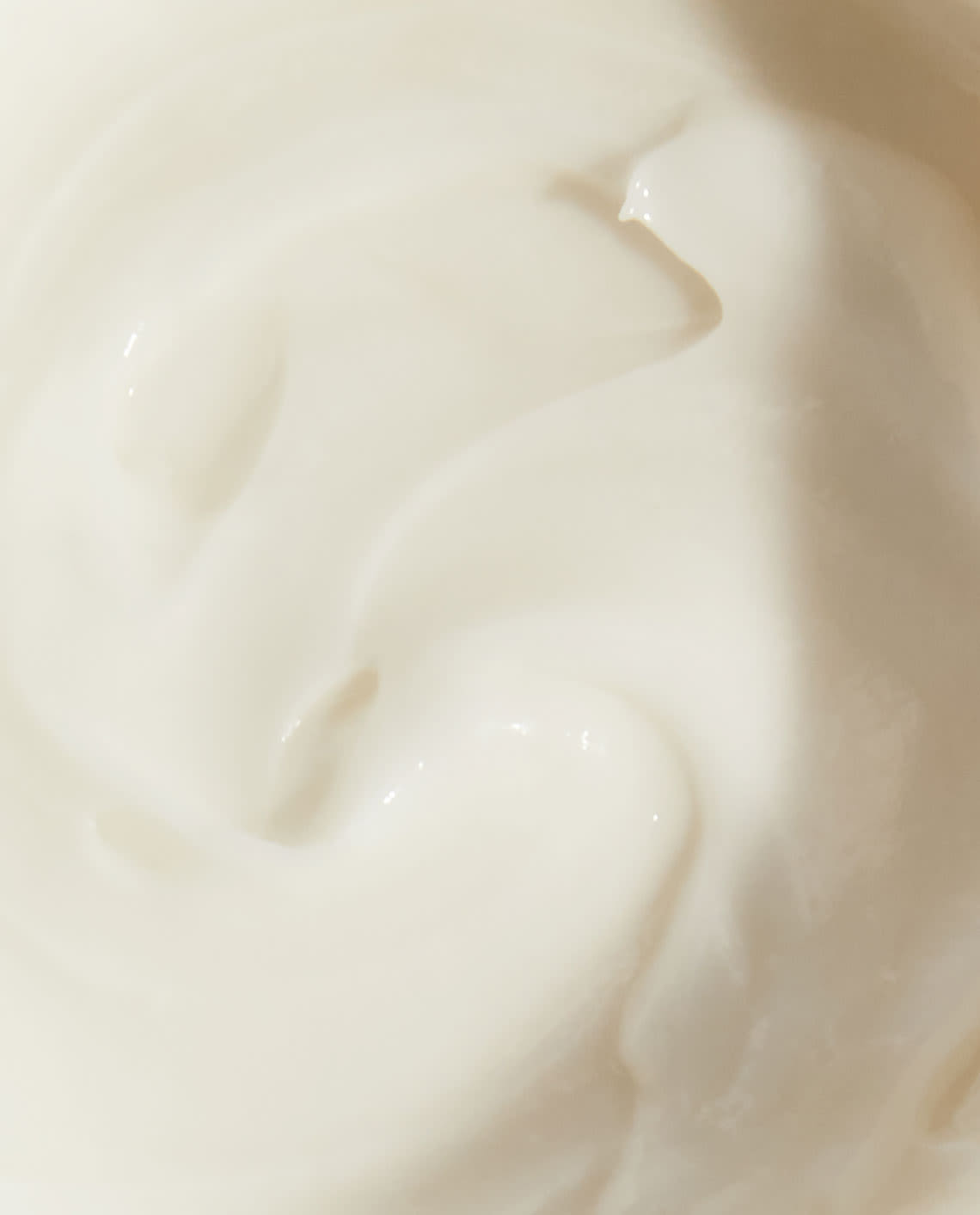 Close view of creamy moisturizer texture.
