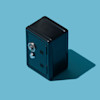 Black safe against a blue backdrop