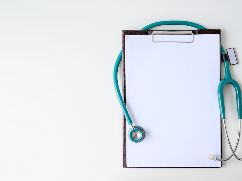 Clipboard with turquoise stethoscope