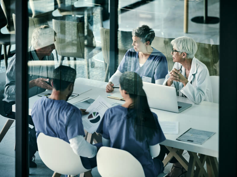 group of nurses in conference room