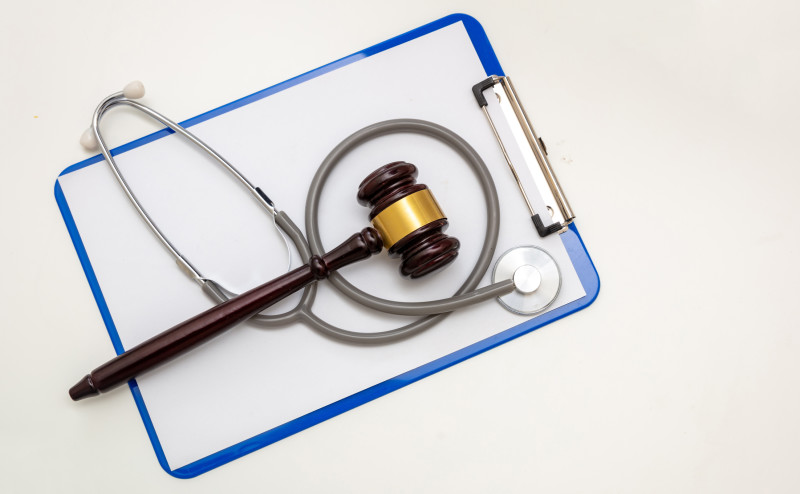 Healthcare and Law concept, Medical malpractice, personal injury lawyer. Medical professional being sued for malpractice