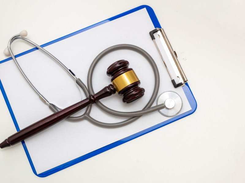 Healthcare and Law concept, Medical malpractice, personal injury lawyer. Medical professional being sued for malpractice