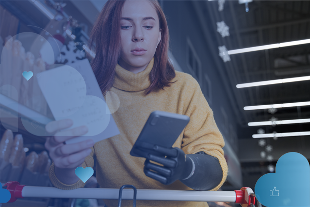 Woman with prosthetic arm holds phone while shopping