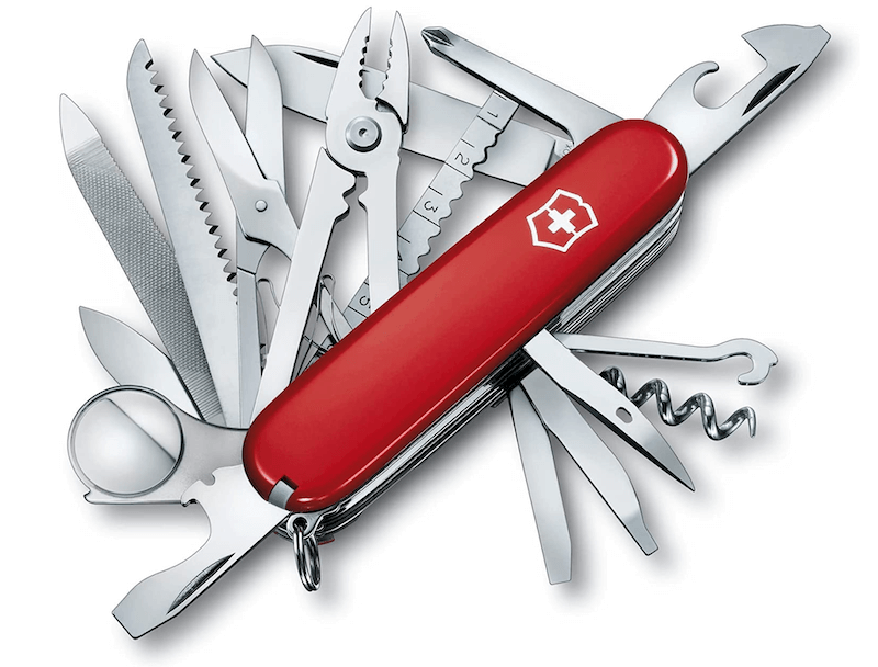 A red Swiss Army Knife exposing all of its tools