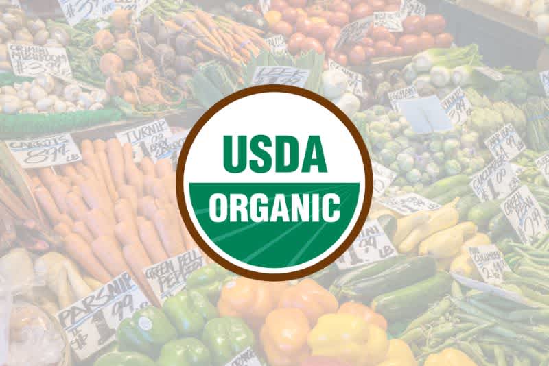 usda organic label on top of background of vegatables