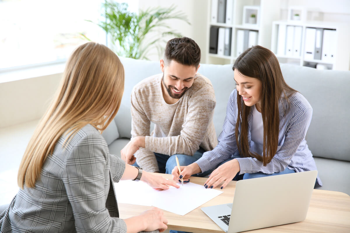 couple signing a form