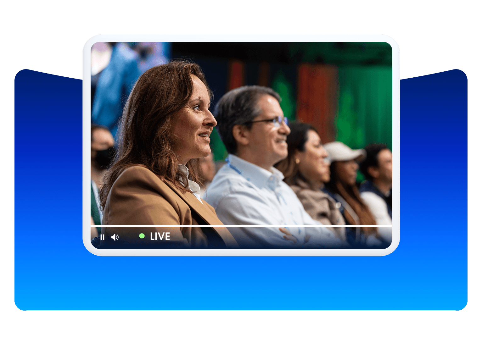 A video UI inside a frame showing audience members watching a live event.