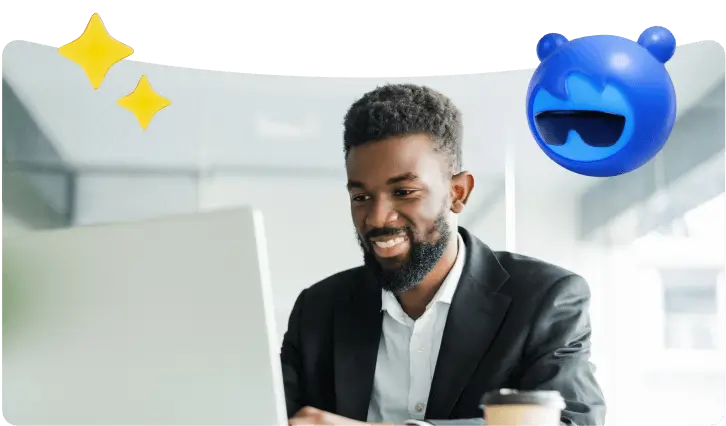 A man looking at his laptop with the Agentforce logo in the corner