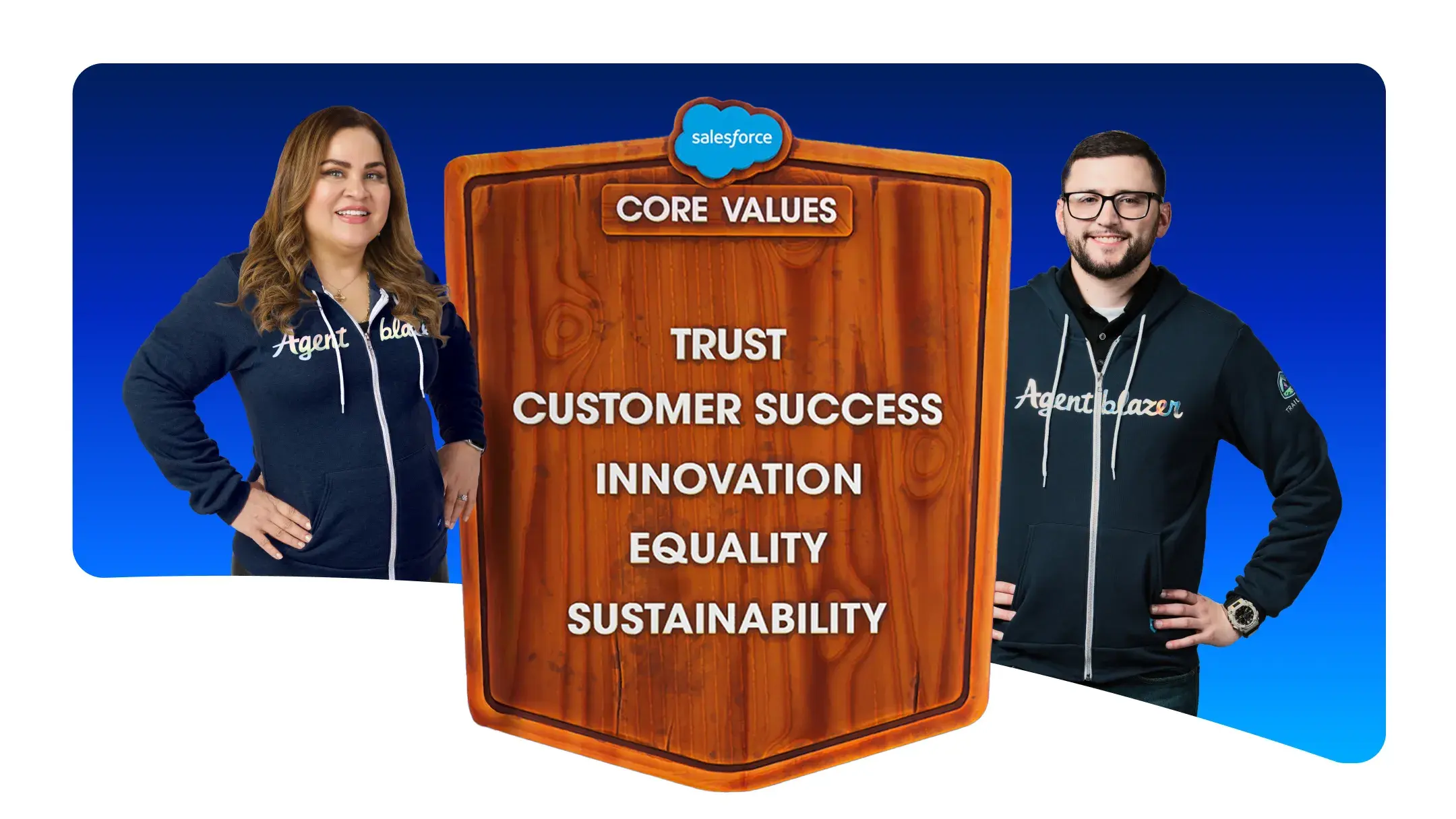 An Agentblazer and Salesforce mascot Astro stand beside a plaque featuring our core values: trust, customer success, innovation, equality and sustainability.