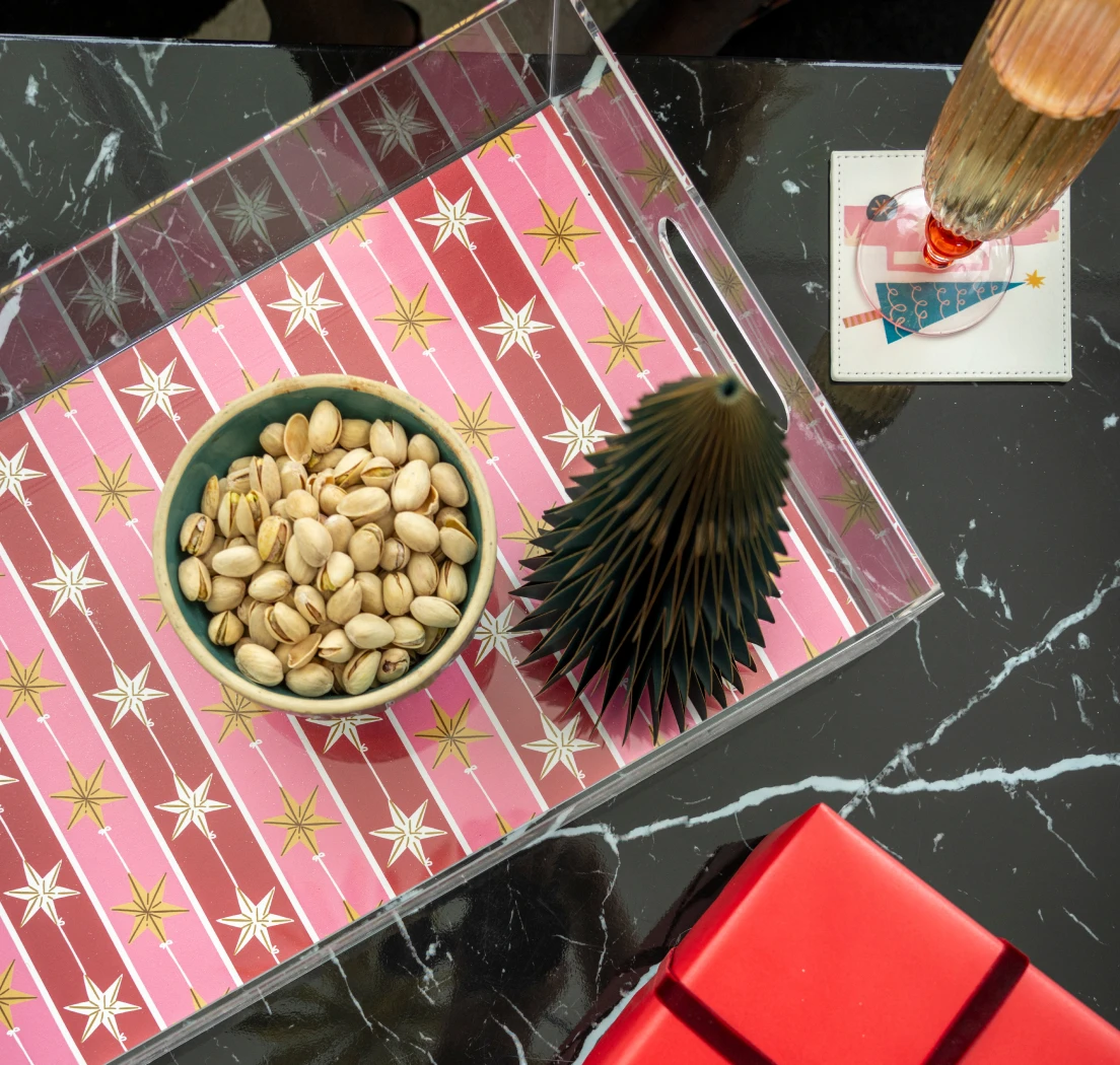 an image of a lucite tray with the tree topper holiday print insert