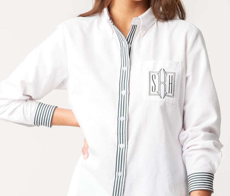 Women wearing Chelsea button down shirt embroidered with romanesque style monogram