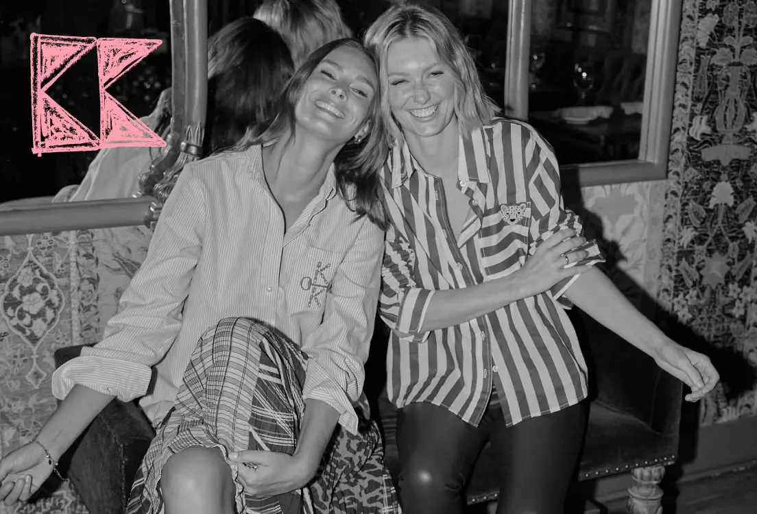 Two women wearing Katie Kime oxfords with monograms