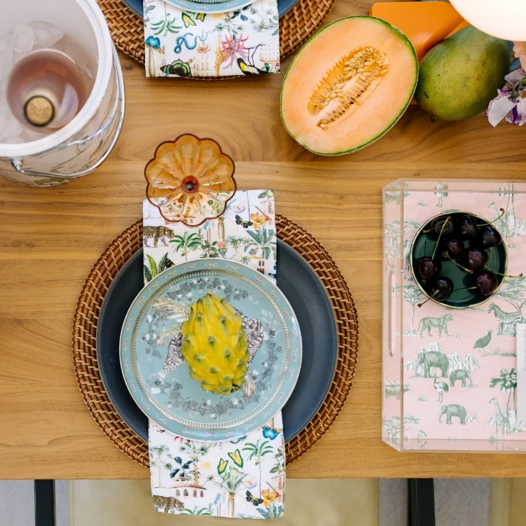 table top setting with lucite tray, tea towel, and ice bucket with print from katie kime natural world collection