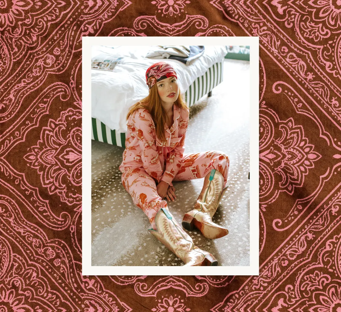 a woman wearing toile pajamas