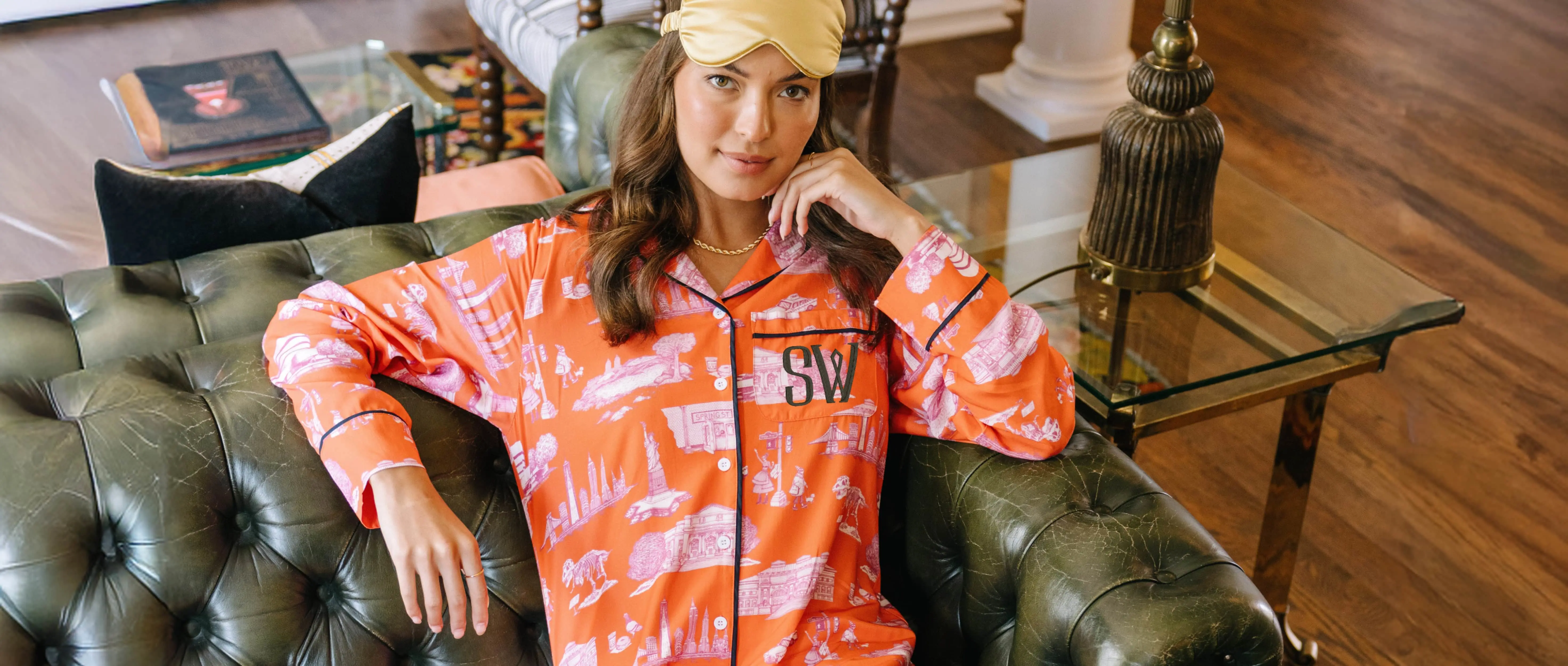 a woman wearing the new york city toile sleep shirt that is monogrammed