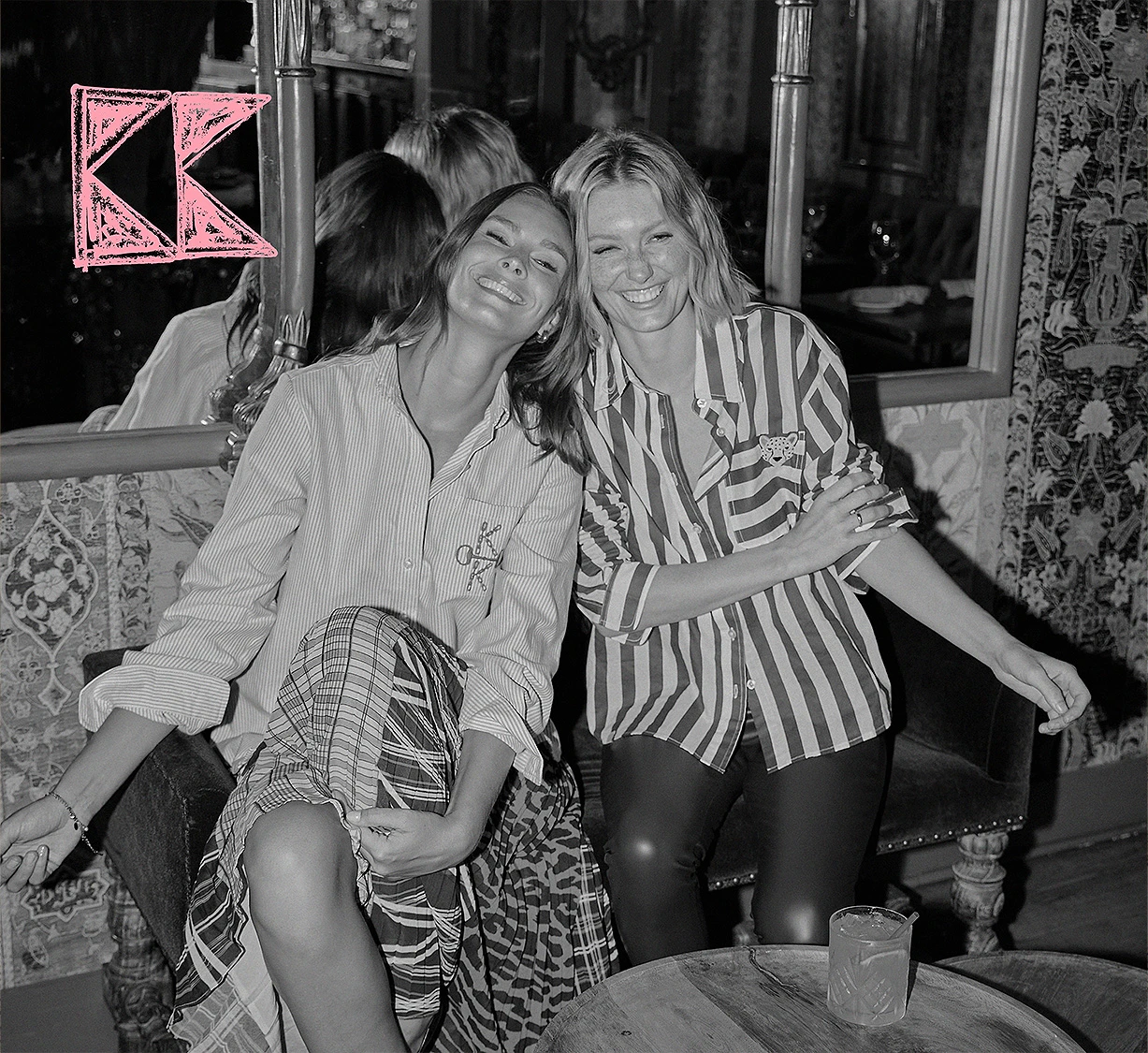 Katie Kime in Italy wearing a pink retro stripe charlotte shirt