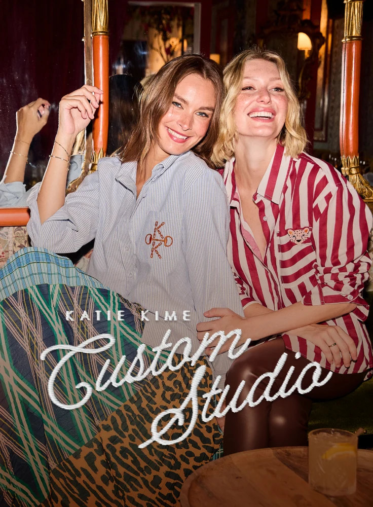 two women wearing customized katie kime shirts with embroidery