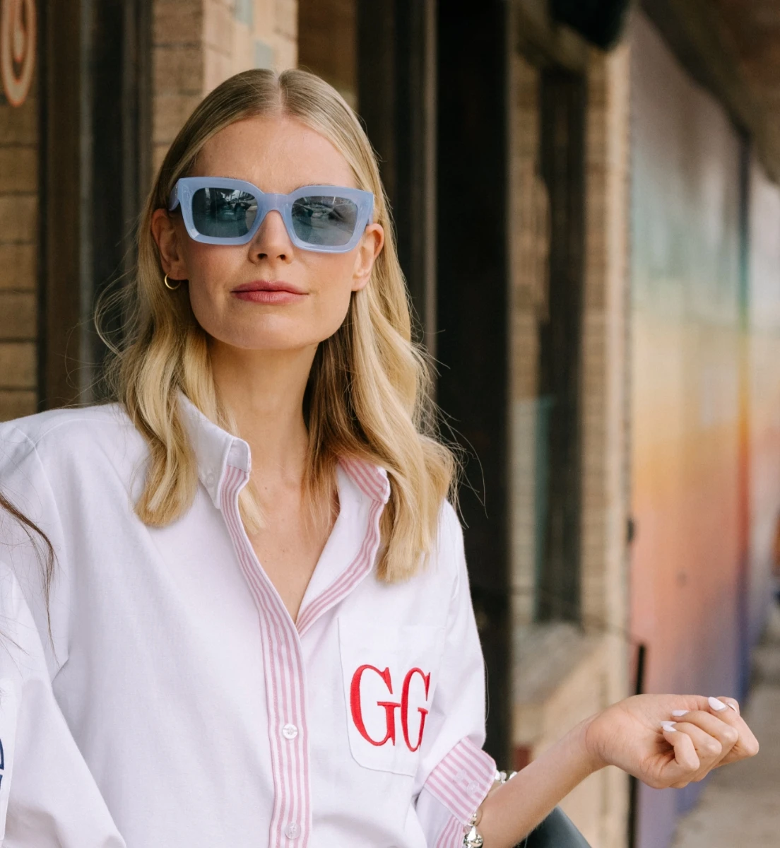 woman wearing monogrammed oxford button down shirt