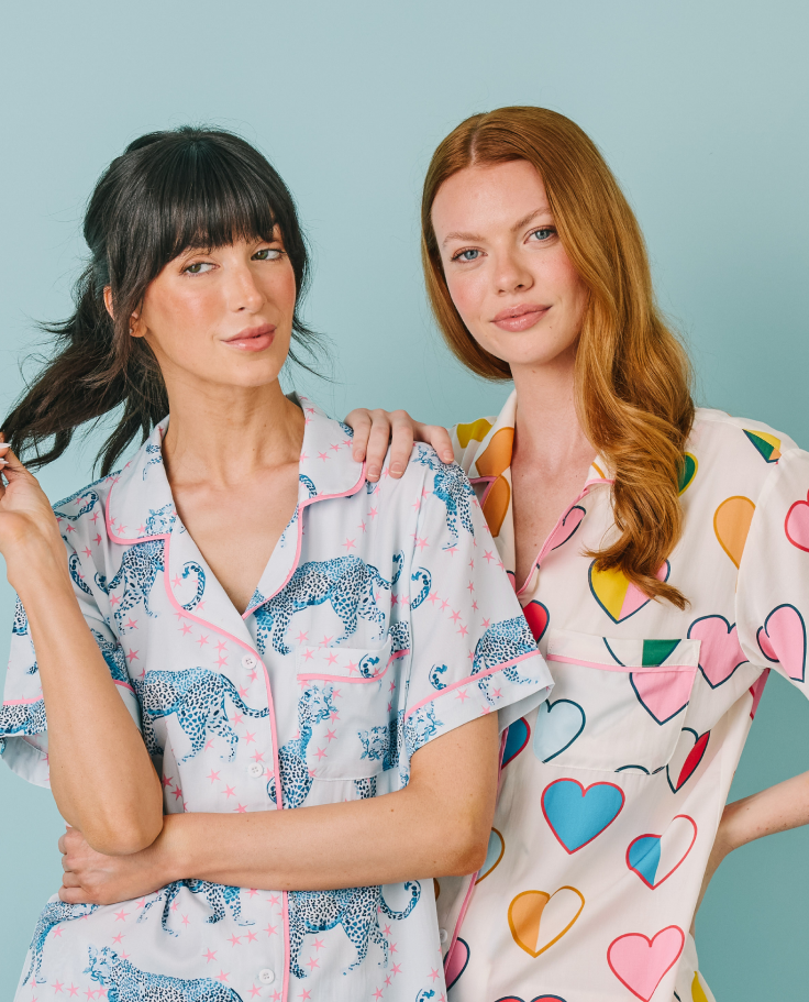 two women wearing pajamas