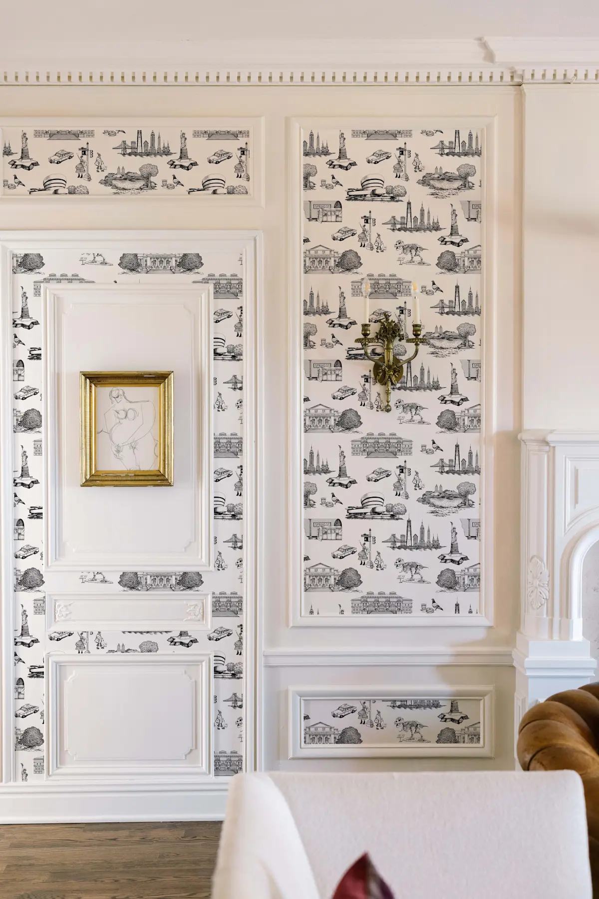 New York Toile wallpaper framed in white wall panels