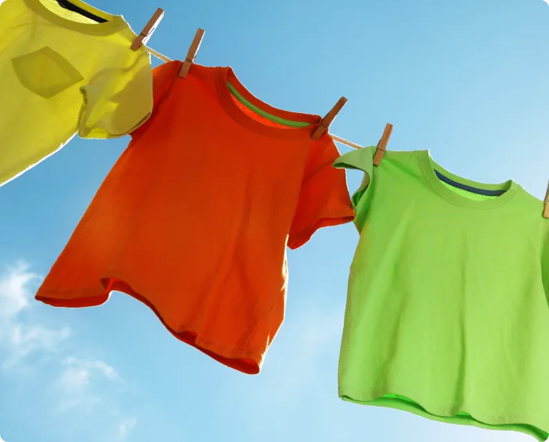Colorful Clothes Hanging On A Line In Bright Sunlight