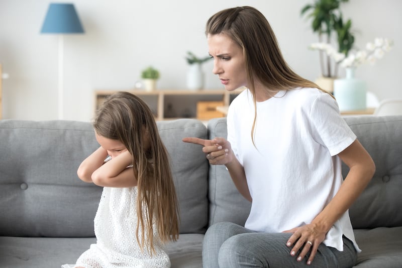 Canva-Angry-mother-scolding-stubborn-kid-closing-ears-not-listening