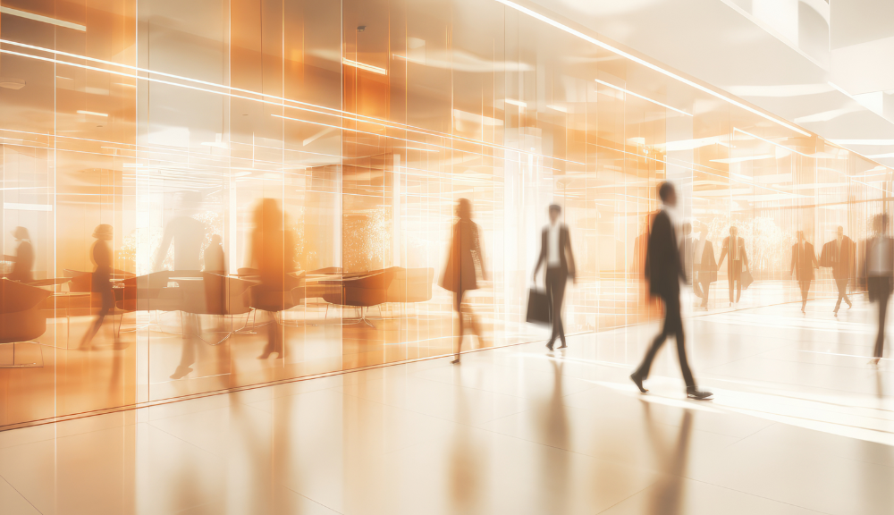 busy employees walking in a corporate building