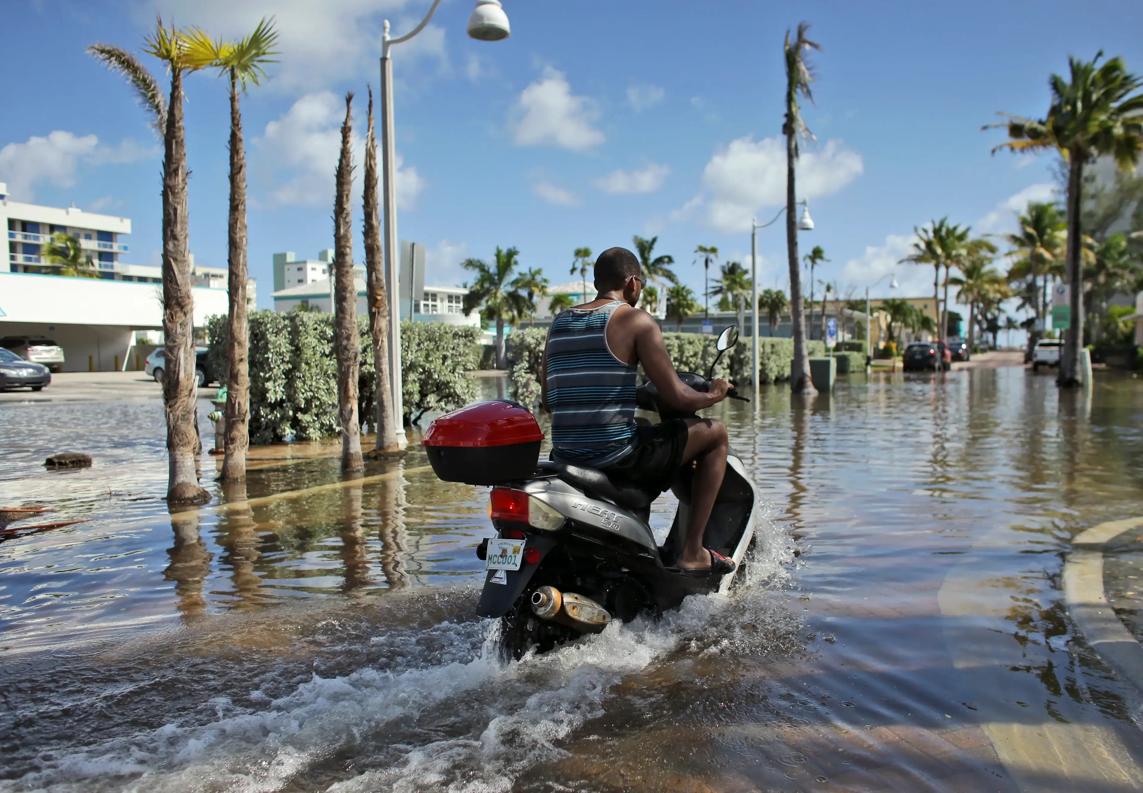 AP_Miami-sunny-day-flood-scooter