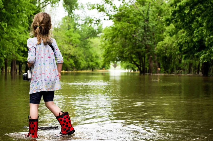 Development image _ girl in puddle boots