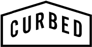 Curbed wordmark in black sans-serif type enclosed within a stylized house outline