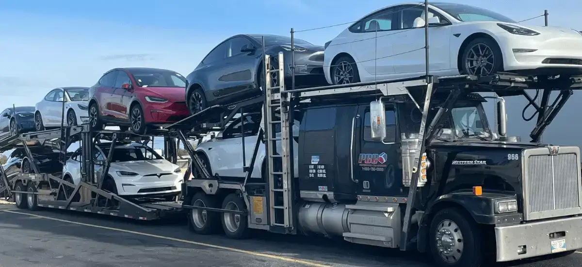 truck with full load of teslas