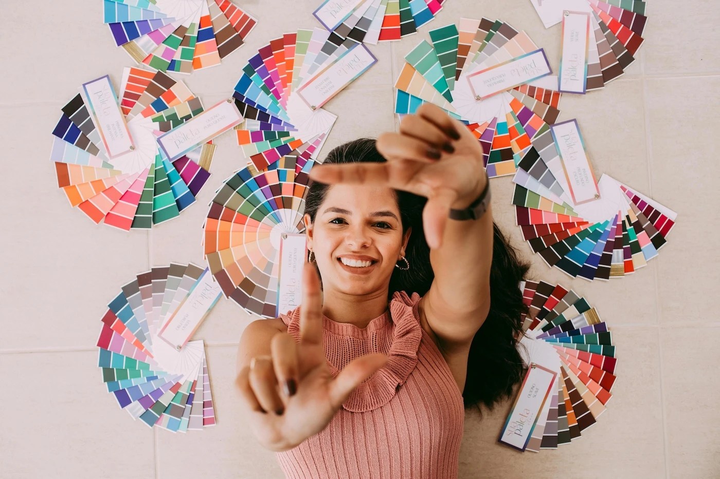 Photo by Helena Lopes: https://www.pexels.com/photo/woman-making-gestures-with-color-wheels-9492924/
