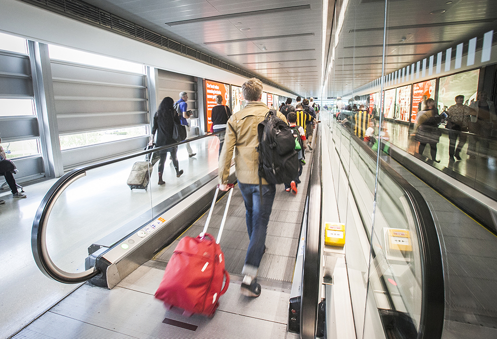 Passenger On Travelator - 1000px