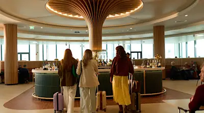 The 51st & Green is the only lounge located after U.S. Preclearance, designed for a smooth transatlantic departure.