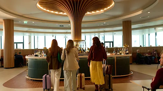 The 51st & Green is the only lounge located after U.S. Preclearance, designed for a smooth transatlantic departure.