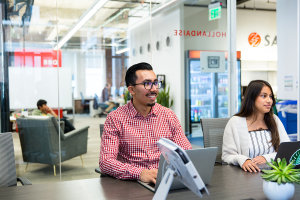 sauce labs employee smiling in meeting