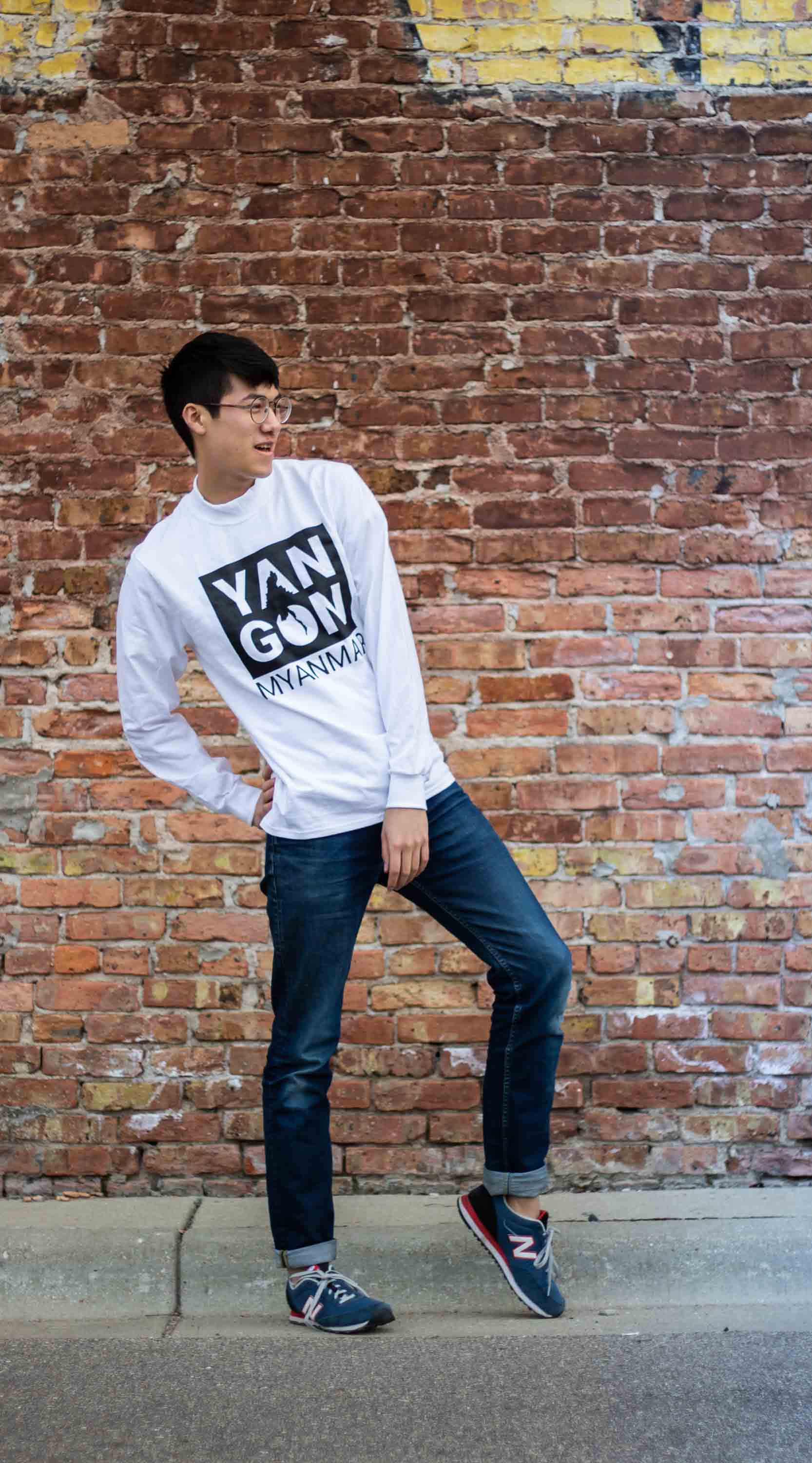 Person leaning on one foot with one hand on hip