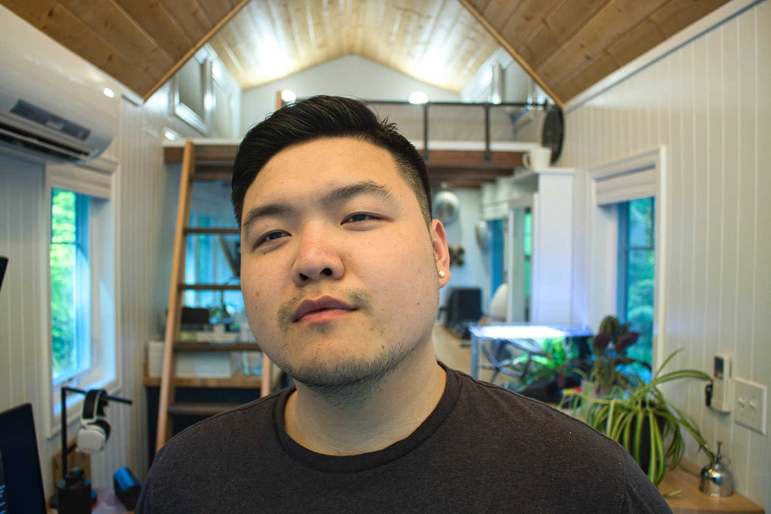 Kaung in his tiny home thinking about boba tea Kaung in his tiny home thinking about boba tea