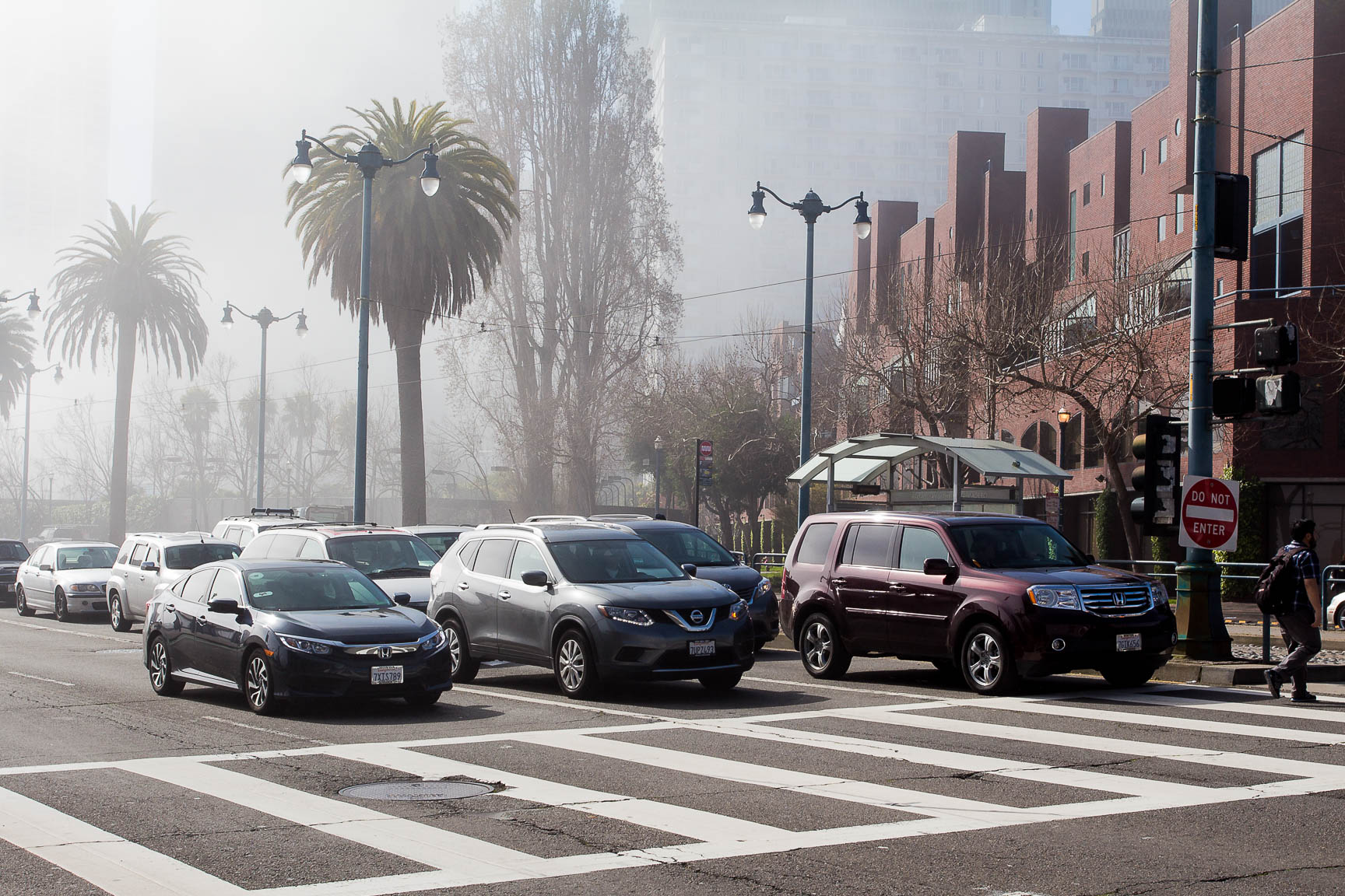 Cars waiting at a stoplight