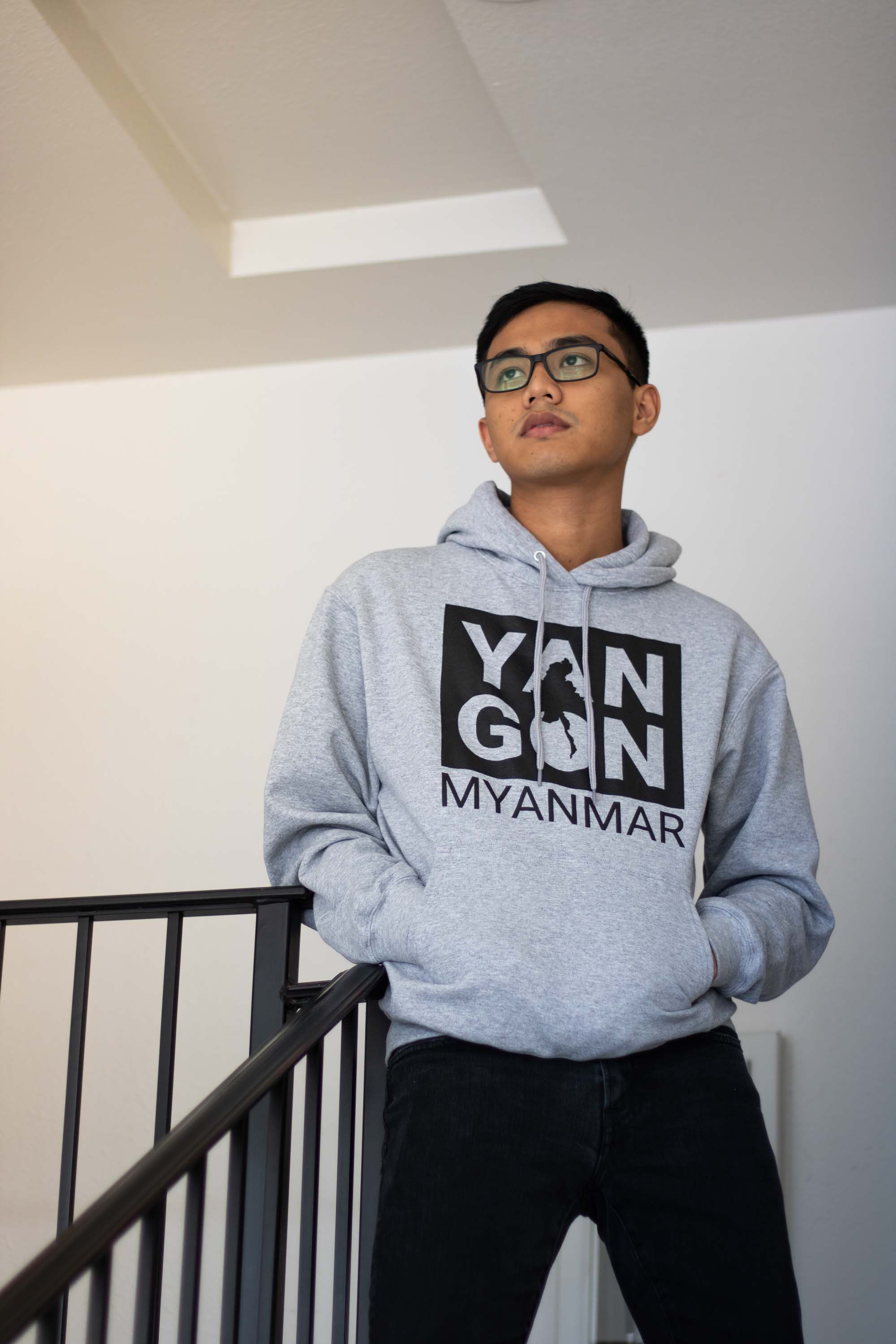 Person leaning on staircase