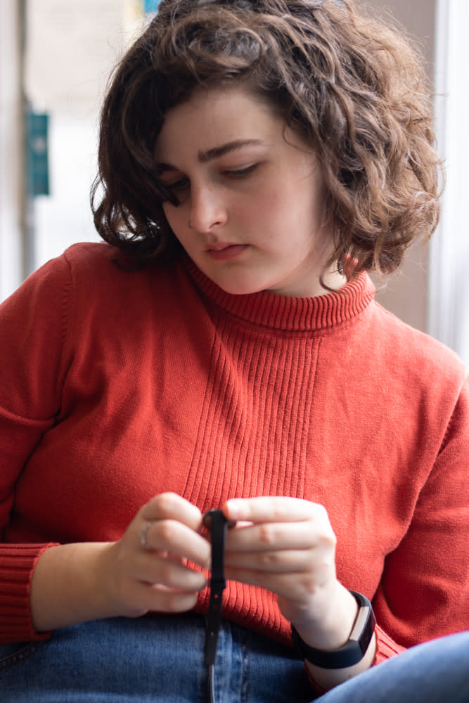 Person holding a watch