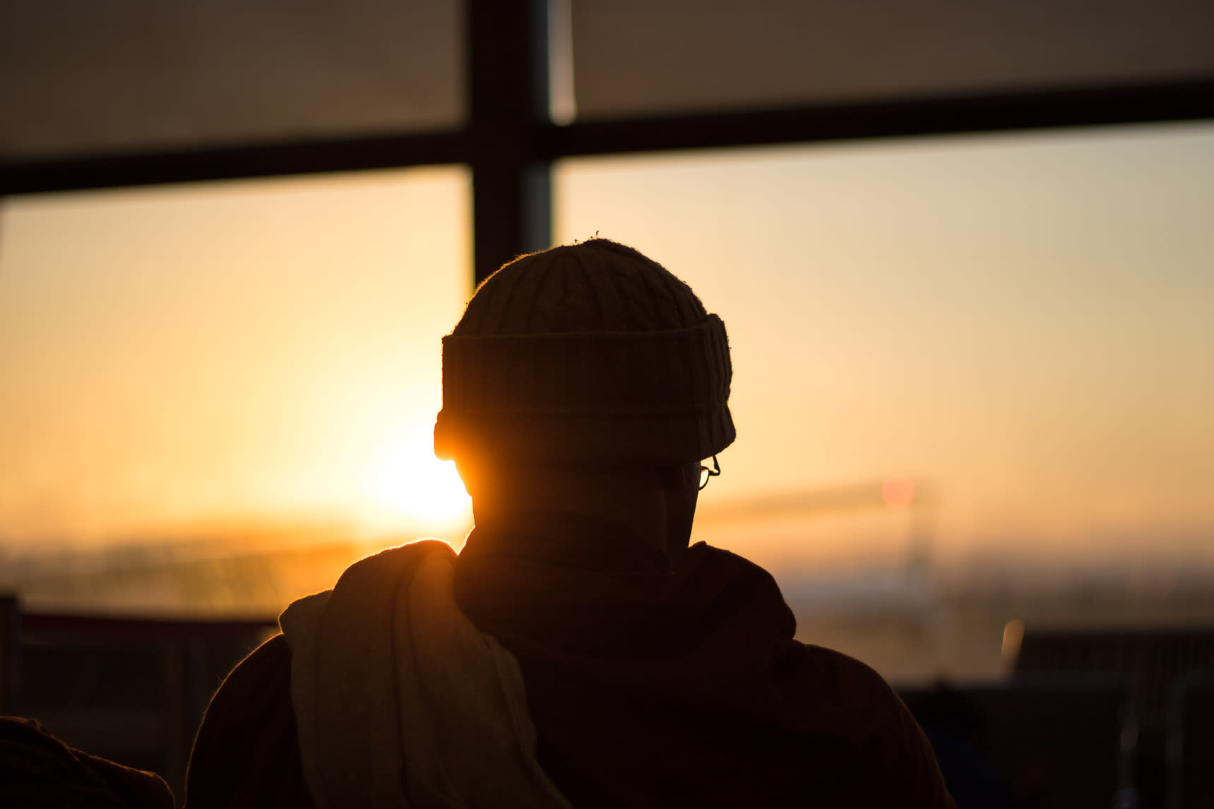 A silhouette of a monk