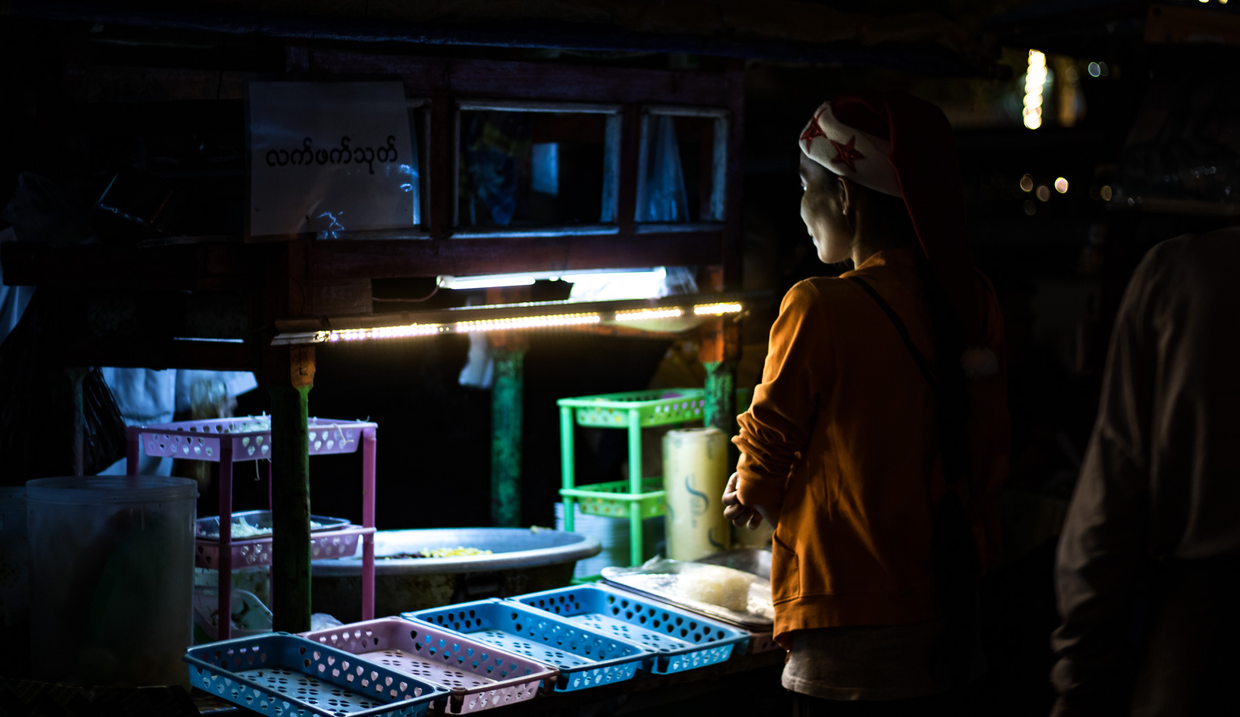 Person tending a vendor cart