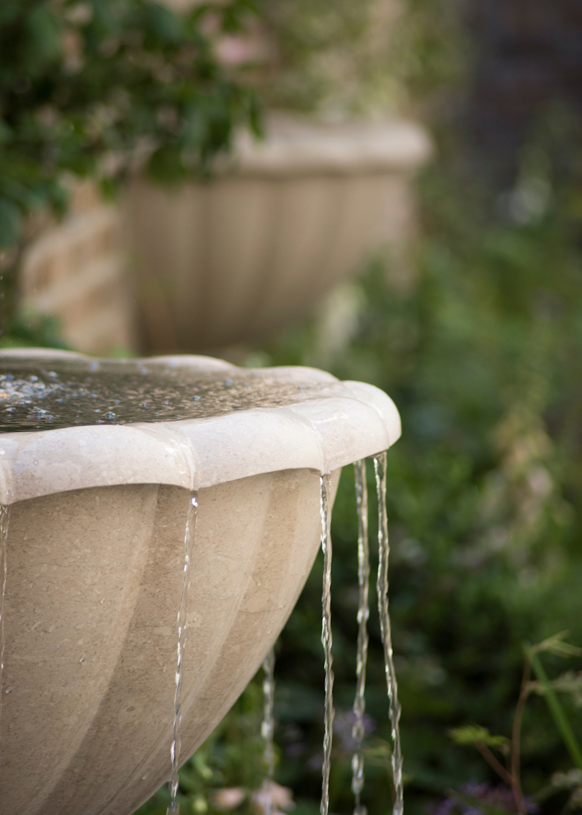 stone water feature in a garden