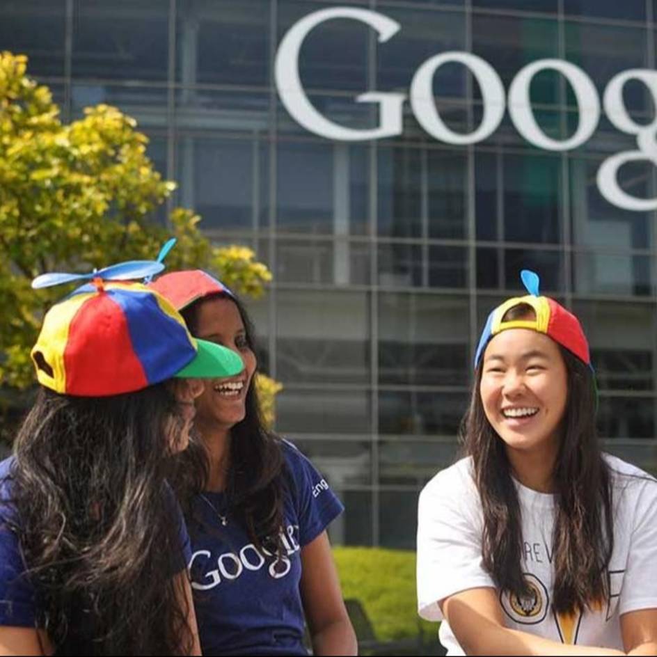 Google employees interact during their first day at the campus.
