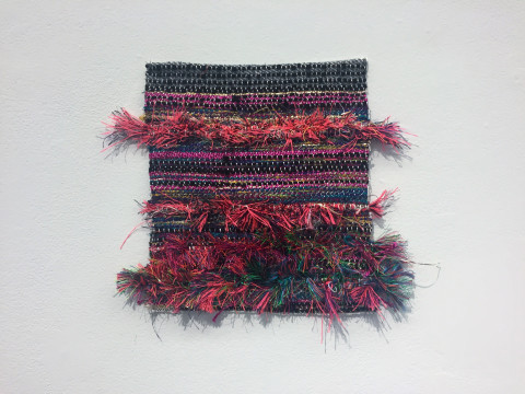 Stop Making Sense, 2017. Nylon selvage remnants and yarn. 10 × 9 inches.